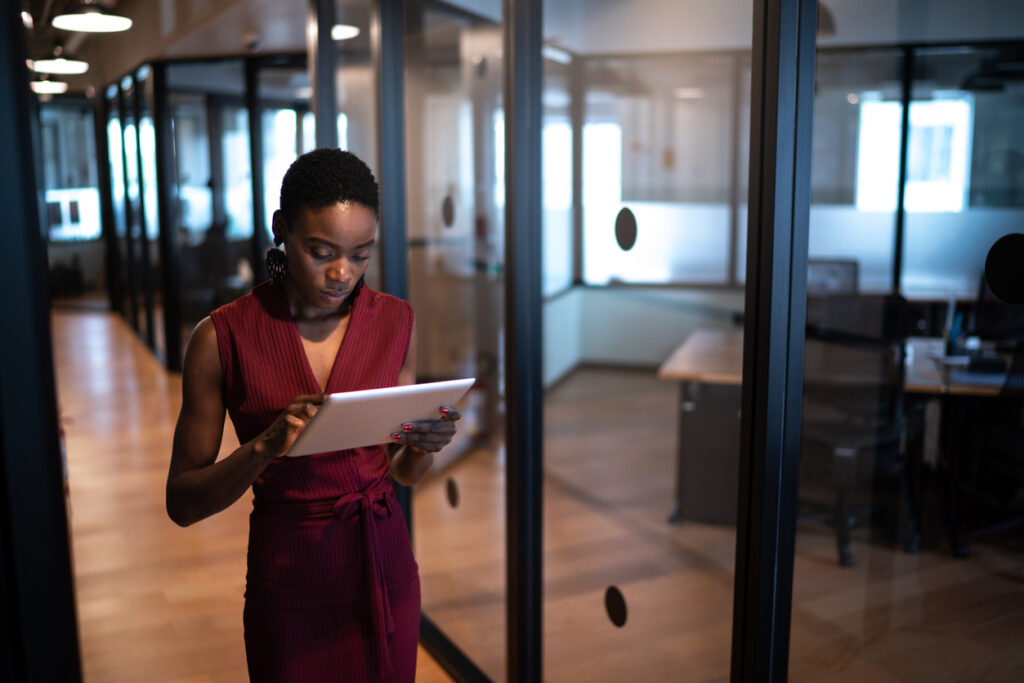 Black woman entrepreneur analyzing numbers